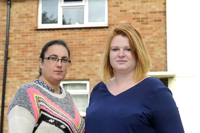 Navy wives, Tracy Stinton (left) and Lucy Stigar outside Tracys MoD house in Gosport which she says is unfit to live in.

Picture Ian Hargreaves (161254-4)