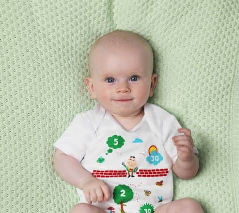 The babygrow with CPR instructions from St John Ambulance