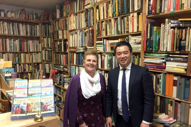CHALLENGE Carol Waldron, the owner of Bookends, Emsworth, with Alan Mak