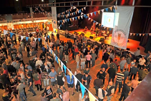 Drinkers at the 2015 Portsmouth Beer Festival which was held inside Portsmouth Guildhall