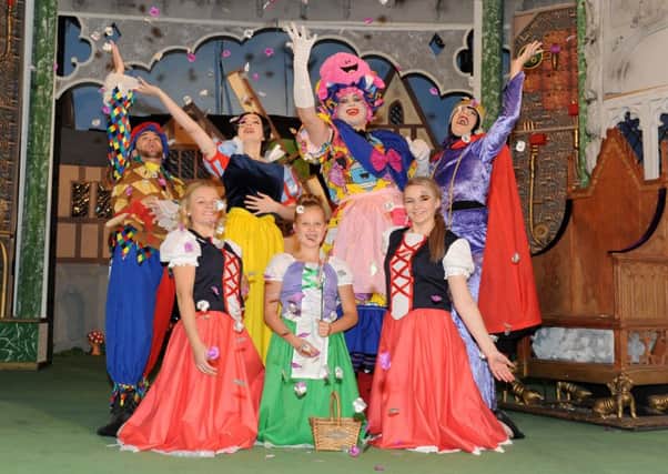 Back from left, Jack Tutt as Muddles the Jester, Victoria Lucie as Snow White, Alex Forman as Nanny Nakeroo and Paula Brett as The Evil Queen with front from left, singers and dancers Megan Bull, Hollie Palmer and Sydney Jennings 

Picture: Sarah Standing (161406-4522)