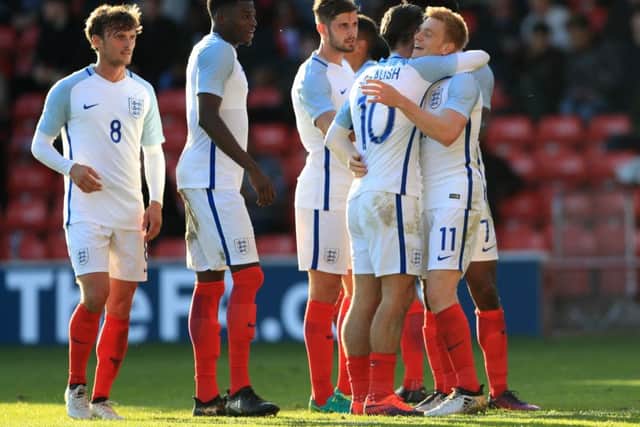Gosport-born John Swift, left, celebrates Duncan Watmore's goal