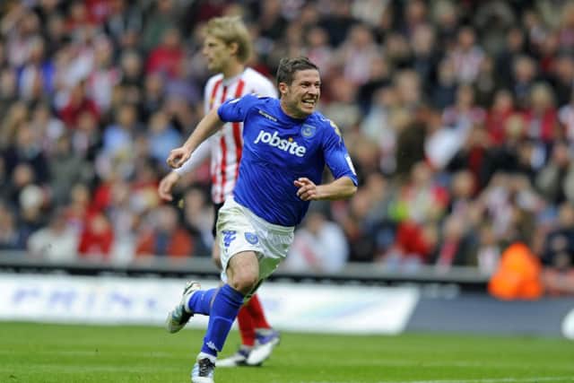 David Norris celebrates his equaliser in the derby draw with Southampton in 2012