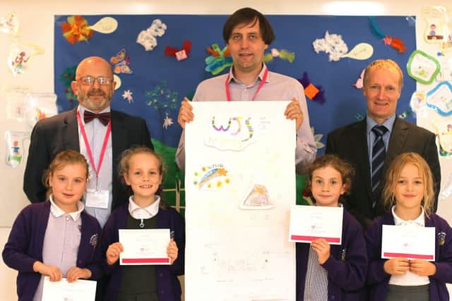 Les Creak, manager of Wärtsilä, David Hill, technology faculty outreach coordinator from the University of Portsmouth, Paul Marshallsay,headteacher of Portsmouth High School Junior School with Ivy Maeve Sandys-McCormack, Astrid Patrick, Erin Ross and Charlotte Parker at the STEM challenge at Portsmouth High School