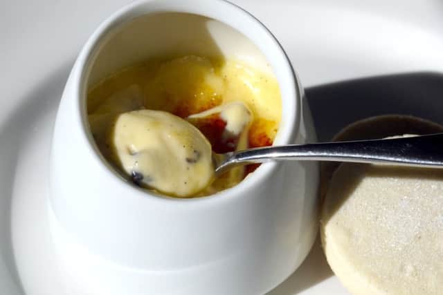 Creme brulee with blackberries and blueberries