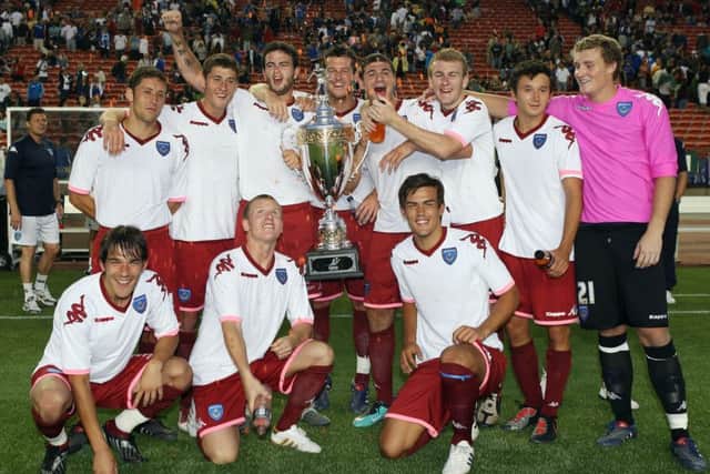 Pompey celebrate their Edmonton Cup win in 2010. Picture: Joe Pepler