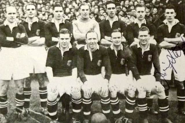 The Scotland side with Jimmy Stephen on the far right, standing.