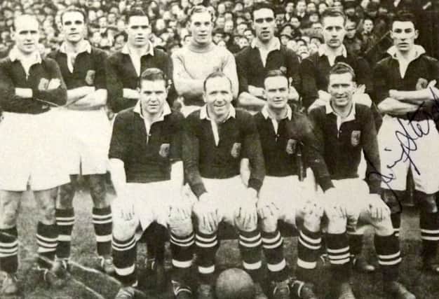 The Scotland side with Jimmy Stephen on the far right, standing.
