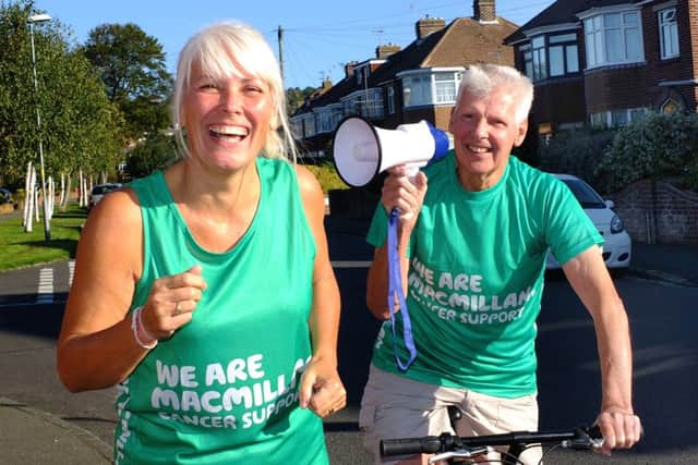 Brian Ward, who was diagnosed with oesophageal cancer last year, cycles behind his daughter Sharon Lobban in order to help her prepare for the Great South Run this weekend. Sharon will run for Macmillan Cancer Support.