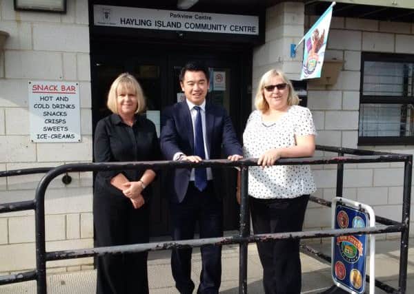Alan Mak at the Hayling Community Centre with manager Tania Jones and administrator Tina Lambert