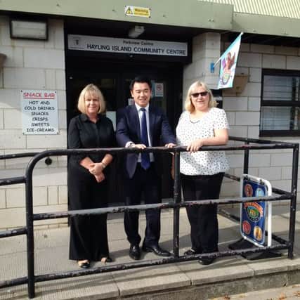 Alan Mak at the Hayling Community Centre with manager Tania Jones and administrator Tina Lambert