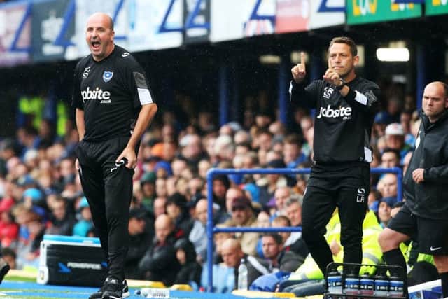 Pompey boss Paul Cook, left. Picture: Joe Pepler