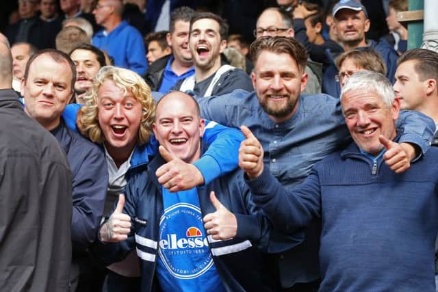 Pompey fans celebrate victory over Leyton Orient at Brisbane Road. Picture: Joe Pepler