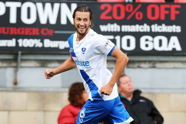 Christian Burgess celebrates scoring the winner against Leyton Orient last Saturday Picture: Joe Pepler