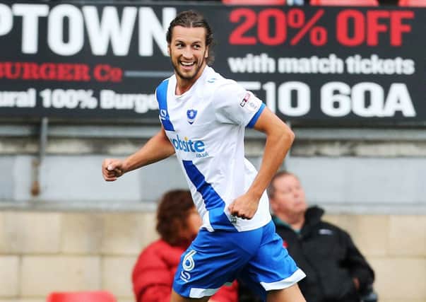 Christian Burgess celebrates scoring the winner against Leyton Orient last Saturday Picture: Joe Pepler