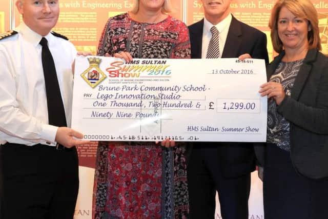 Captain Peter Towell, the Commanding Officer of HMS Sultan, Gosport MP Caroline Dinenage and Stephen Shaw and Linda Howe from Brune Park School