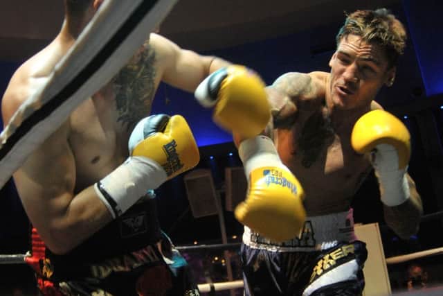 Joel McIntyre, right, on his way to victory against Vladimir Idranyi at Liquid & Envy back in July Picture: Mick Young