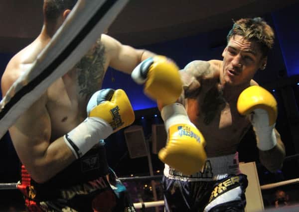 Joel McIntyre, right, on his way to victory against Vladimir Idranyi at Liquid & Envy back in July Picture: Mick Young