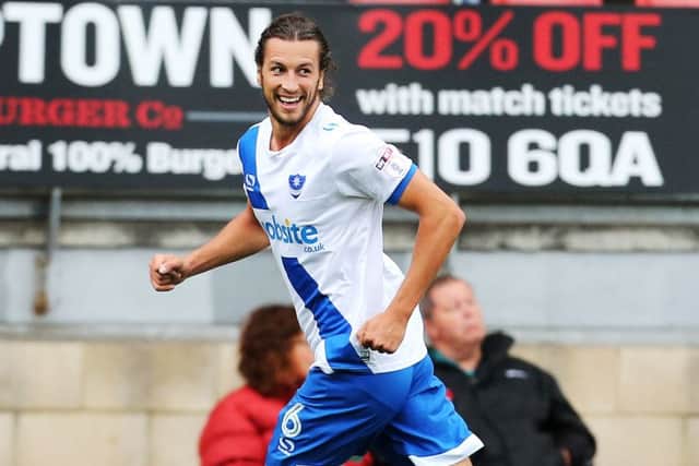 Christian Burgess celebrates scoring against Leyton Orient last Saturday Picture: Joe Pepler