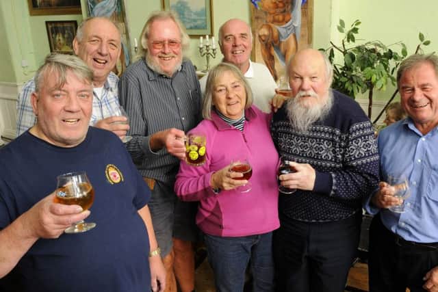 Enjoying the event are, from the left, Peter Clark, Paul Read, John Kendall, Clare Harding, Colin Cooper, Rodney Simpson and Andrew Edmond 	  	             Picture: Malcolm Wells (161014-1005)