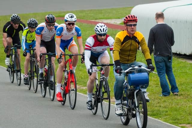 John Heffernan leads, from front, Ollie Hitchings, Alex Collins, Calum Laycock, Barney Clacy and Simon Veater-Young in a Fareham Wheelers motor pacing session at the Mountbatten Centre 	                              Picture: Rob Atkins