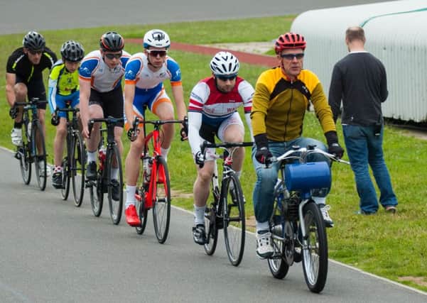 John Heffernan leads, from front, Ollie Hitchings, Alex Collins, Calum Laycock, Barney Clacy and Simon Veater-Young in a Fareham Wheelers motor pacing session at the Mountbatten Centre 	                              Picture: Rob Atkins