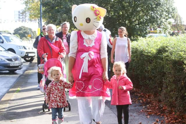 Tayla Crouwkamp, two, with Caroline Ralph as Hello Kitty and Grace Morris,,three, outside The Pyramids Centre, Southsea
Picture: Habibur Rahman