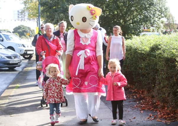 Tayla Crouwkamp, two, with Caroline Ralph as Hello Kitty and Grace Morris,,three, outside The Pyramids Centre, Southsea
Picture: Habibur Rahman