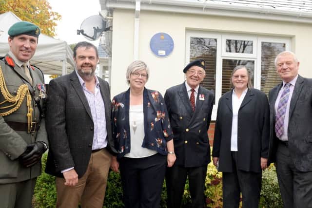 From left, Brigadier Richard Spencer, Deputy Commandant General of the Royal Marines, homeowners Greg and Sarah Hughes, Commander Bill Evershed RN Retired, Cllr.Sara Schillemore and Lord Paddy Ashdown
Picture: Sarah Standing (161414-4937)