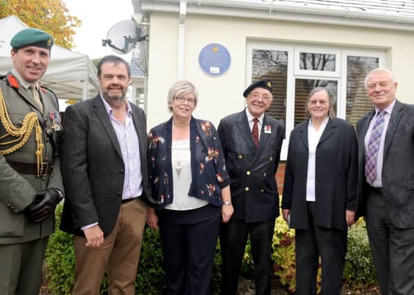 From left, Brigadier Richard Spencer, Deputy Commandant General of the Royal Marines, homeowners Greg and Sarah Hughes, Commander Bill Evershed RN Retired, Cllr.Sara Schillemore and Lord Paddy Ashdown 

Picture: Sarah Standing (161414-4937)
