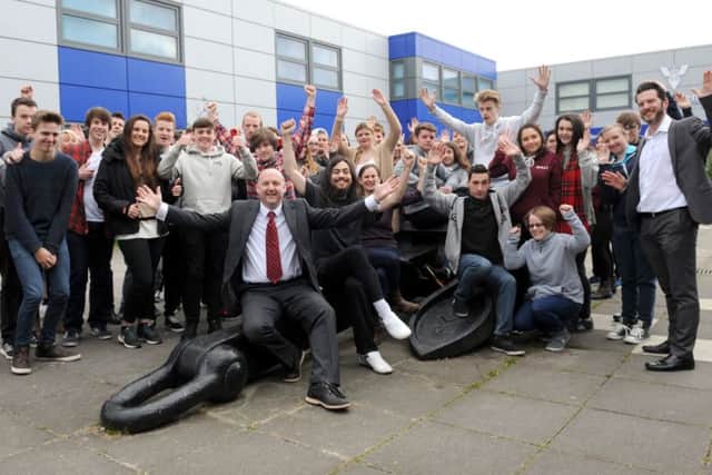 Staff and students at St Vincent College in Gosport, including principal Matt Atkinson, centre, celebrate their 'good' rating from Ofsted in March
