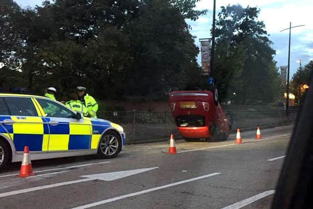 A car flipped over after a two-car collision in Park Road South, Havant at 5.30pm on Monday Picture: Charly Pay