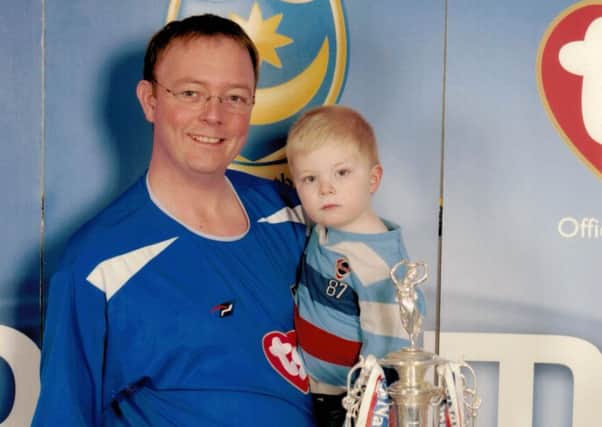Mark Hancock with his son Matthew before he lost the weight