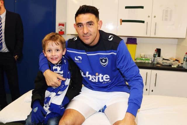 Max Uttley with his favourite Pompey player - Gary Roberts