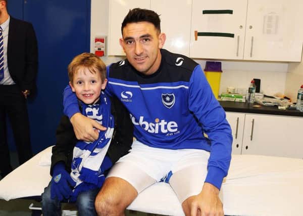 Max Uttley with his favourite Pompey player - Gary Roberts