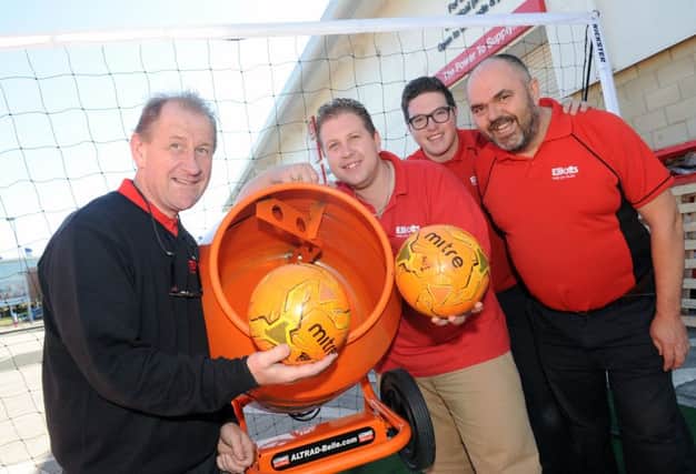 Visitors had the chance to win a football shirt of their choice by scoring a goal into a cement mixer and raising money for Jo's Cervical Trust at Elliott's Tool Centre