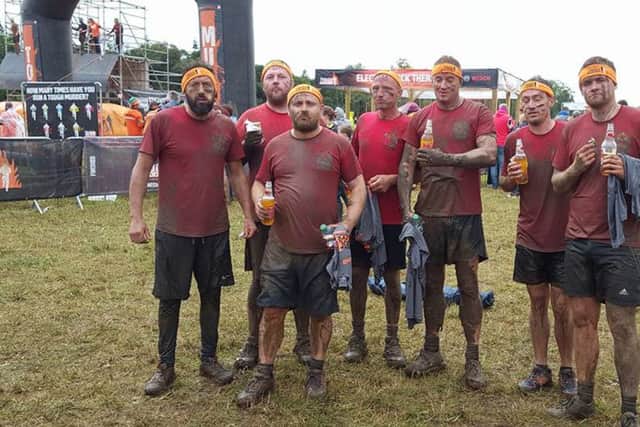 Coaches from Team Wiseman Boxing Academy took part in Tough Mudder for Hannah's Holiday Home