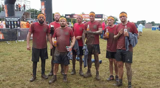 Coaches from Team Wiseman Boxing Academy took part in Tough Mudder for Hannah's Holiday Home