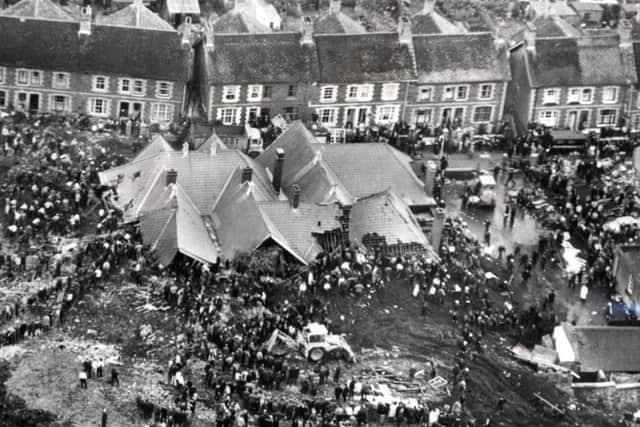 The Aberfan disaster in October 1966 when a slag tip slipped and killed 116 children and 28 adults.The roof of Pantglas Junior School stands like an island in a sea of mud and debris