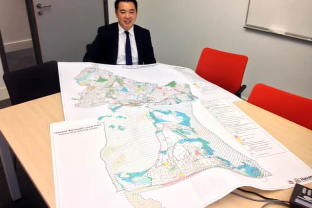 Alan Mak MP with a map of the Local Plan