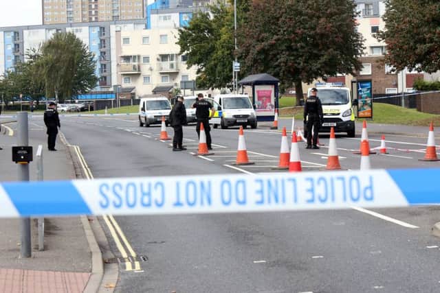 Police investigate after a serious assault in Fratton Picture: UKNIP