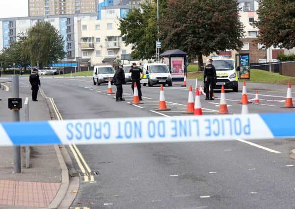 Police investigate after a serious assault in Fratton  Picture: UKNIP