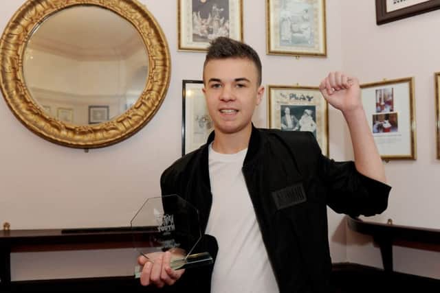 Lewis Hine collecting his Hero of the Year Award at this year's News Youth Awards Picture: Sarah Standing (160820-1757)