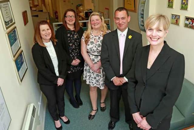 Kate Knight, who leads the Gosport office of Biscoes, front,
with, from left, Louise Roberts, Jen Derrick, Rachel Lees and Gary Morgan.