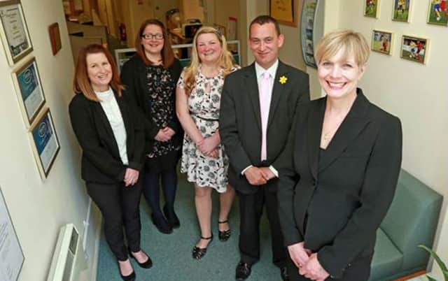 Kate Knight, who leads the Gosport office of Biscoes, front, 
with, from left, Louise Roberts, Jen Derrick, Rachel Lees and Gary Morgan.