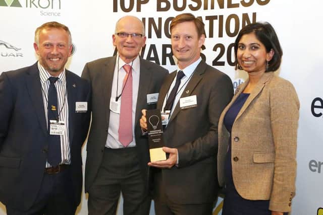 From left, director of Aqua Cooling Kevin Lancaster, IOP president and professor of physics at University of Exeter Roy Sambles, Aqua Cooling director Simon Davis and Suella Fernandes MP