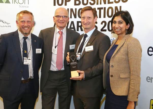From left, director of Aqua Cooling Kevin Lancaster, IOP president and professor of physics at University of Exeter Roy Sambles, Aqua Cooling director Simon Davis and Suella Fernandes MP