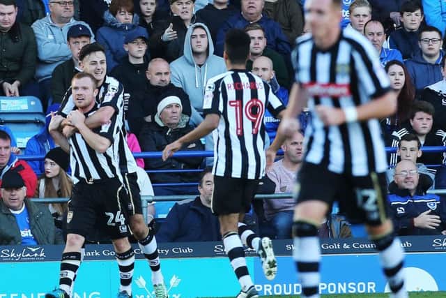 Notts County celebrate Adam Campbell's winner at Fratton Park Picture: Joe Pepler