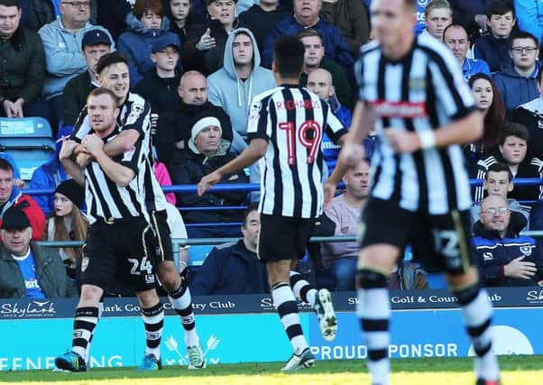 Notts County celebrate Adam Campbell's winner at Fratton Park Picture: Joe Pepler