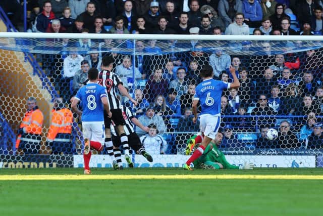 County's Adam Campbell scores his first goal of the match between Portsmouth and Notts County at Fratton Park. Photo by Joe Pepler/Digital South.